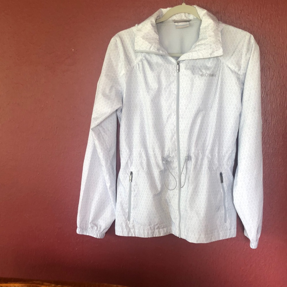 Columbia Hooded Polyester Jacket with drawstring around waist.